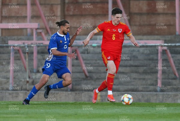 040621 - Wales U21 v Moldova U21, UEFA U21 EURO 2023 Qualifying Match - Morgan Boyes of Wales gets away from Virgiliu Postolachi of Moldova
