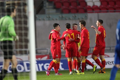 220313 - Wales U21 v Moldova U21 UEFA Championship Qualifying match, Llanelli - Wales celebrate after Tom Lawrence scores goal