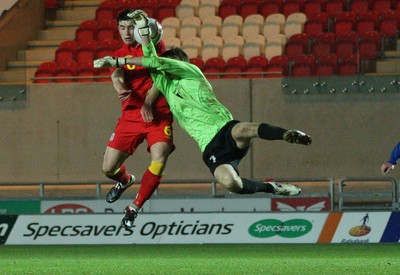 220313 - Wales U21 v Moldova U21 UEFA Championship Qualifying match, Llanelli - Wales' Joe Walsh and Moldova's keeper Alexi Koselev contest the ball