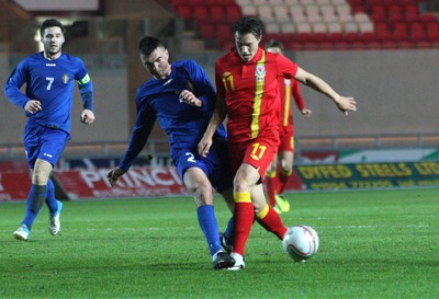 220313 - Wales U21 v Moldova U21 UEFA Championship Qualifying match, Llanelli - Wales' Billy Bodin is challenged by Moldova's Ivan Prodan