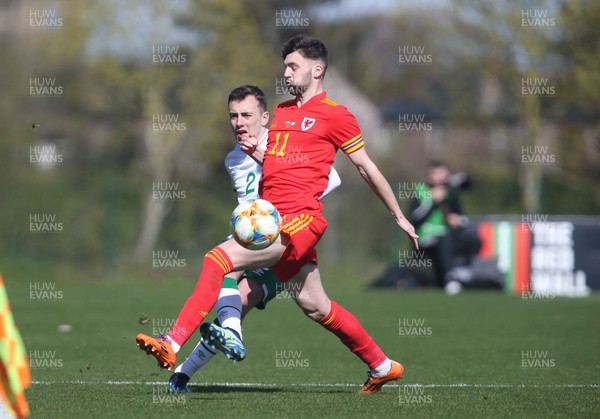 260321 - Wales U21 v Republic of Ireland U21 - International Friendly - Ireland's Lee O'Connor and Wales' Joe Adams tussle for the ball