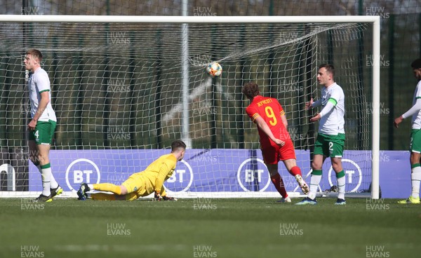 260321 - Wales U21 v Republic of Ireland U21 - International Friendly - Joe Adams (hidden to left) scores first goal of match and celebrates