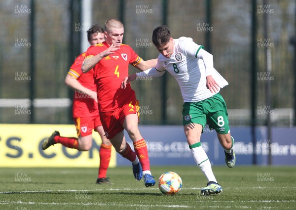 260321 - Wales U21 v Republic of Ireland U21 - International Friendly - Ryan Stirk of Wales and Conor Noss