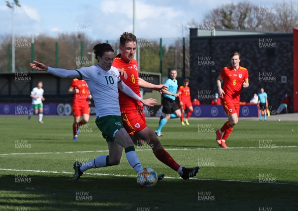 260321 - Wales U21 v Republic of Ireland U21 - International Friendly - Louie Watson of Ireland and Terry Taylor