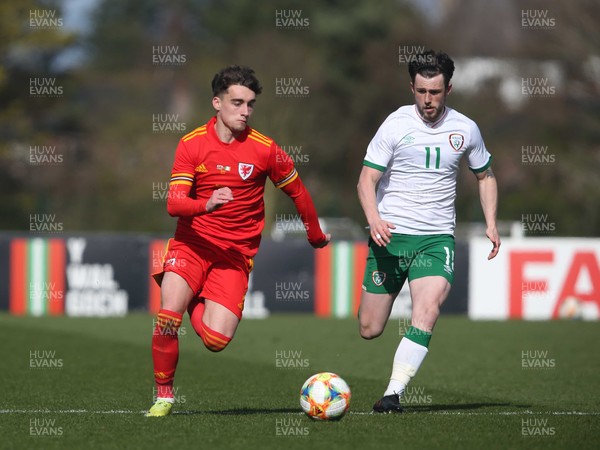 260321 - Wales U21 v Republic of Ireland U21 - International Friendly - Niall Huggins of Wales and Will Ferry