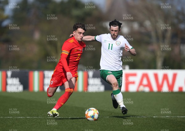 260321 - Wales U21 v Republic of Ireland U21 - International Friendly - Niall Huggins of Wales and Will Ferry
