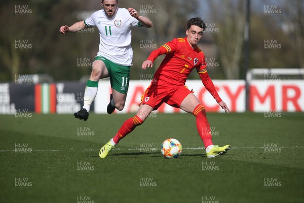 260321 - Wales U21 v Republic of Ireland U21 - International Friendly - Will Ferry of Ireland and Niall Huggins of Wales 