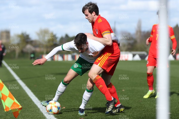 260321 - Wales U21 v Republic of Ireland U21 - International Friendly - Sion Spence of Wales and Conor Noss of Ireland
