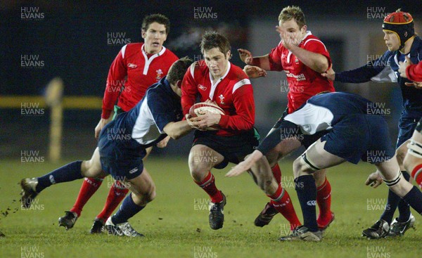 100206Wales v Scotland U21, Rodney Parade, Newport Wales' Andrew Bishop looks for a way through the Scotland defence  