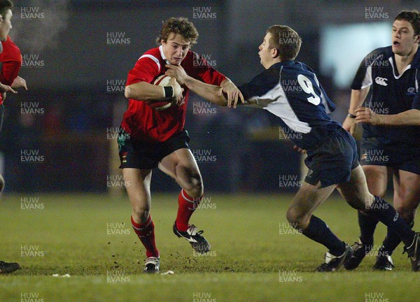 100206Wales v Scotland U21, Rodney Parade, Newport Wales' Martin Roberts is caught by opposite number Greig Laidlaw  