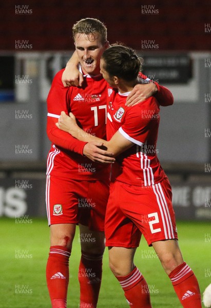 161018 - Wales U21 v Switzerland U21, European U21 Championship 2019 Qualifier - Connor Evans of Wales, left, is congratulated by Aaron Lewis of Wales after scoring the second goal