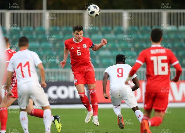 161018 - Wales U21 v Switzerland U21, European U21 Championship 2019 Qualifier - Regan Poole of Wales heads ball past Dimitri Oberlin of Switzerland