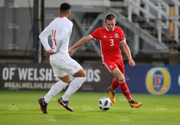161018 - Wales U21 v Switzerland U21, European U21 Championship 2019 Qualifier - Rhys Norrington-Davies of Wales takes on Eray Cumart of Switzerland