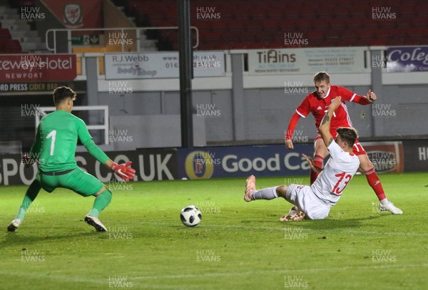 161018 - Wales U21 v Switzerland U21, European U21 Championship 2019 Qualifier -  Connor Evans of Wales shoots to score the third goal