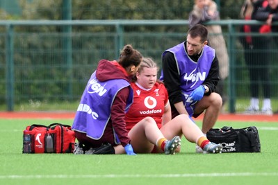 100526 - Wales U21 Women v Ireland U21 Women - Six Nations Women's U21 Series - Elizabeth Cook of Wales Women receives treatment