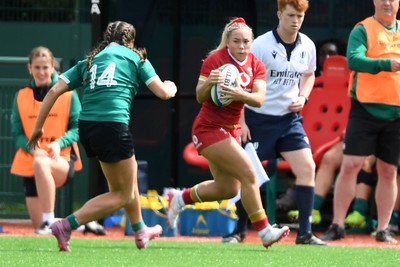 100526 - Wales U21 Women v Ireland U21 Women - Six Nations Women's U21 Series - Amy Williams of Wales Women is challenged by Katie Corrigan Ireland Women