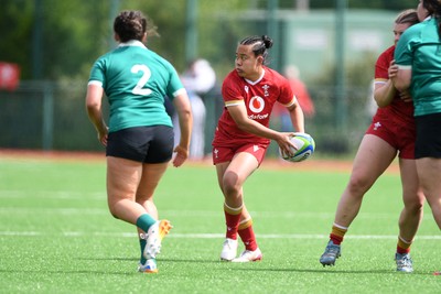 100526 - Wales U21 Women v Ireland U21 Women - Six Nations Women's U21 Series - Jenna De Vera of Wales Women is challenged by Emma Dunican Ireland Women