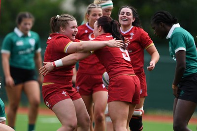 100526 - Wales U21 Women v Ireland U21 Women - Six Nations Women's U21 Series - Sian Jones of Wales Women celebrates scoring a try with team mates