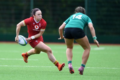 100526 - Wales U21 Women v Ireland U21 Women - Six Nations Women's U21 Series - Sian Jones of Wales Women is challenged by Katie Corrigan Ireland Women