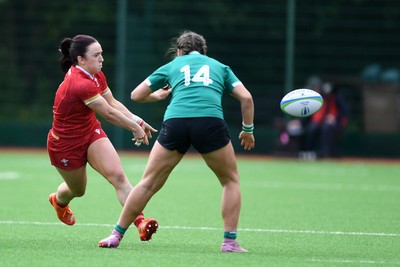 100526 - Wales U21 Women v Ireland U21 Women - Six Nations Women's U21 Series - Sian Jones of Wales Women is challenged by Katie Corrigan Ireland Women