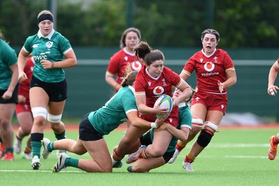 100526 - Wales U21 Women v Ireland U21 Women - Six Nations Women's U21 Series - Gwennan Hopkins of Wales Women is challenged by Siofa Hession Ireland Women