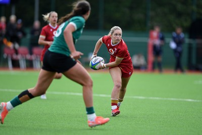 100526 - Wales U21 Women v Ireland U21 Women - Six Nations Women's U21 Series - Hanna Marshall of Wales Women is challenged by Rosin Maher Ireland Women