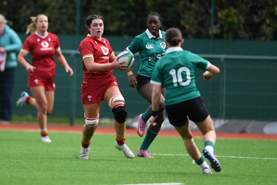 100526 - Wales U21 Women v Ireland U21 Women - Six Nations Women's U21 Series - Lucy Isaac of Wales Women is challenged by Ellen O’Sullivan Sexton Ireland Women
