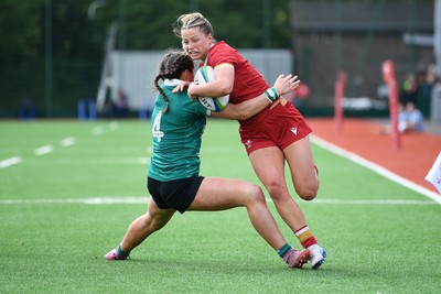 100526 - Wales U21 Women v Ireland U21 Women - Six Nations Women's U21 Series - Amy Williams of Wales Women is challenged by Katie Corrigan Ireland Women
