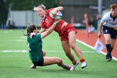 100526 - Wales U21 Women v Ireland U21 Women - Six Nations Women's U21 Series - Amy Williams of Wales Women is challenged by Katie Corrigan Ireland Women