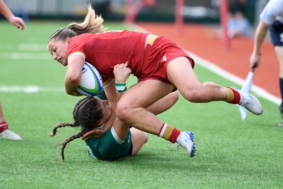 100526 - Wales U21 Women v Ireland U21 Women - Six Nations Women's U21 Series - Amy Williams of Wales Women is challenged by Katie Corrigan Ireland Women