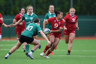100526 - Wales U21 Women v Ireland U21 Women - Six Nations Women's U21 Series - Jenna De Vera of Wales Women is challenged by Ellen O’Sullivan Sexton Ireland Women