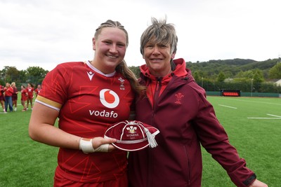100526 - Wales U21 Women v Ireland U21 Women - Six Nations Women's U21 Series - Alaw Pyrs of Wales Women is presented a cap by Liza Burgess, Wales Women's Head Coach