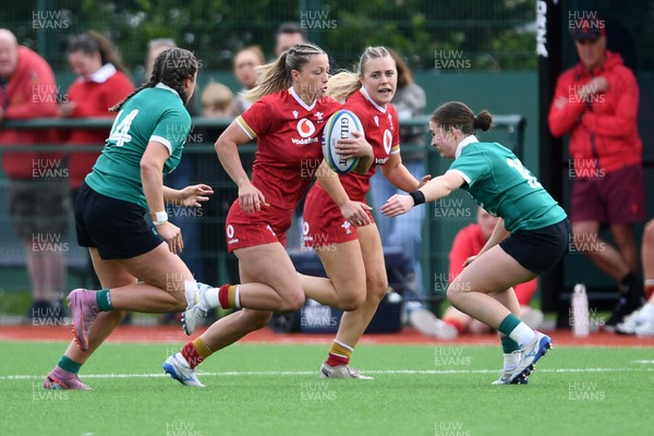 100526 - Wales U21 Women v Ireland U21 Women - Six Nations Women's U21 Series - Amy Williams of Wales Women is challenged by Katie Corrigan Ireland Women
