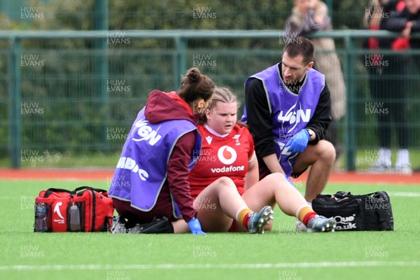 100526 - Wales U21 Women v Ireland U21 Women - Six Nations Women's U21 Series - Elizabeth Cook of Wales Women receives treatment