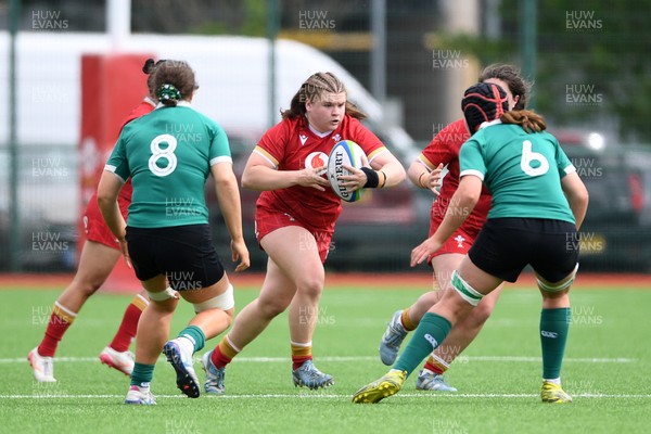 100526 - Wales U21 Women v Ireland U21 Women - Six Nations Women's U21 Series - Elizabeth Cook of Wales Women is challenged by Sally Kelly Ireland Women