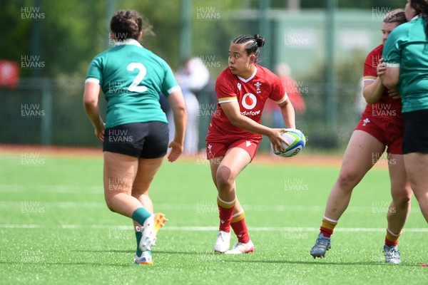 100526 - Wales U21 Women v Ireland U21 Women - Six Nations Women's U21 Series - Jenna De Vera of Wales Women is challenged by Emma Dunican Ireland Women