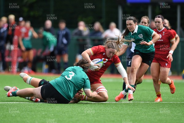 100526 - Wales U21 Women v Ireland U21 Women - Six Nations Women's U21 Series - Alaw Pyrs of Wales Women is challenged by Rosin Maher Ireland Women