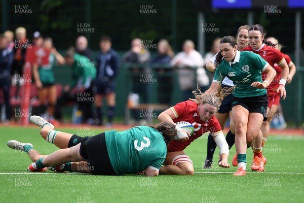 100526 - Wales U21 Women v Ireland U21 Women - Six Nations Women's U21 Series - Alaw Pyrs of Wales Women is challenged by Rosin Maher Ireland Women