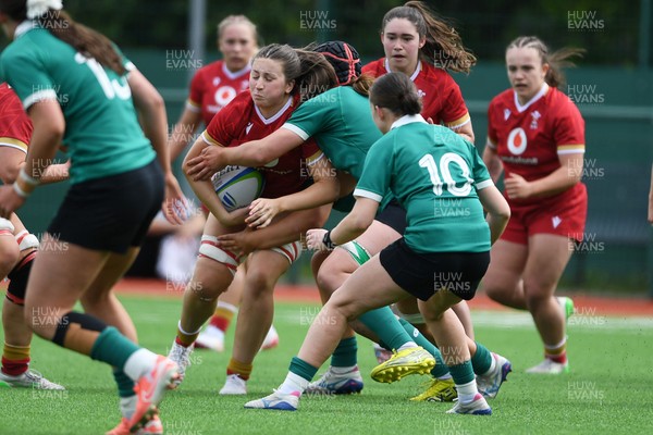 100526 - Wales U21 Women v Ireland U21 Women - Six Nations Women's U21 Series - Robyn Davies of Wales Women is challenged by Sally Kelly Ireland Women