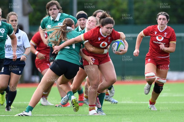 100526 - Wales U21 Women v Ireland U21 Women - Six Nations Women's U21 Series - Gwennan Hopkins of Wales Women is challenged by Siofa Hession Ireland Women