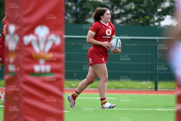 100526 - Wales U21 Women v Ireland U21 Women - Six Nations Women's U21 Series - Gwennan Hopkins of Wales Women scores a try