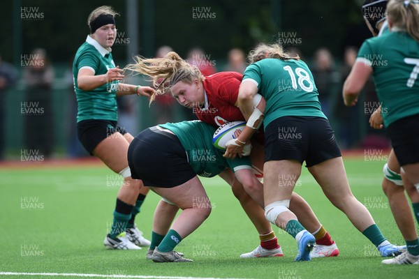 100526 - Wales U21 Women v Ireland U21 Women - Six Nations Women's U21 Series - Alaw Pyrs of Wales Women is challenged by Alisha Flynn Ireland Women