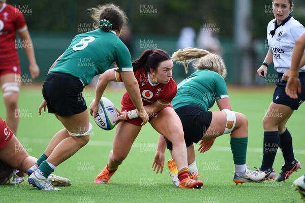 100526 - Wales U21 Women v Ireland U21 Women - Six Nations Women's U21 Series - Sian Jones of Wales Women is challenged by Jemima Adams Verling Ireland Women