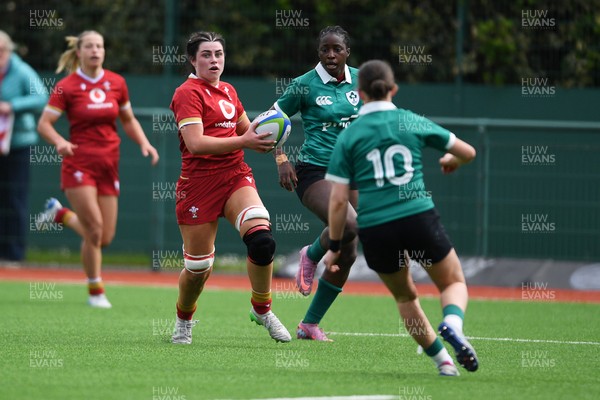 100526 - Wales U21 Women v Ireland U21 Women - Six Nations Women's U21 Series - Lucy Isaac of Wales Women is challenged by Ellen O’Sullivan Sexton Ireland Women