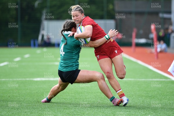 100526 - Wales U21 Women v Ireland U21 Women - Six Nations Women's U21 Series - Amy Williams of Wales Women is challenged by Katie Corrigan Ireland Women