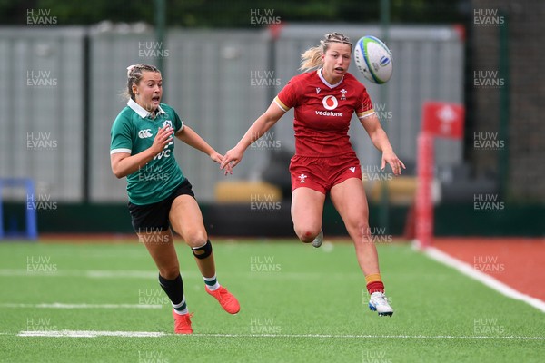 100526 - Wales U21 Women v Ireland U21 Women - Six Nations Women's U21 Series - Amy Williams of Wales Women is challenged by Katie Corrigan Ireland Women