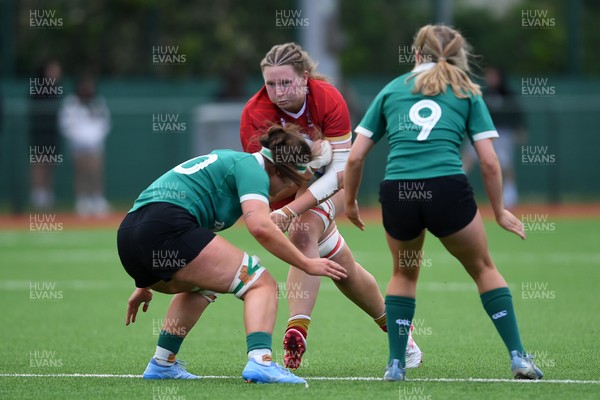 100526 - Wales U21 Women v Ireland U21 Women - Six Nations Women's U21 Series - Alaw Pyrs of Wales Women is challenged by Ellen O’Sullivan Sexton Ireland Women
