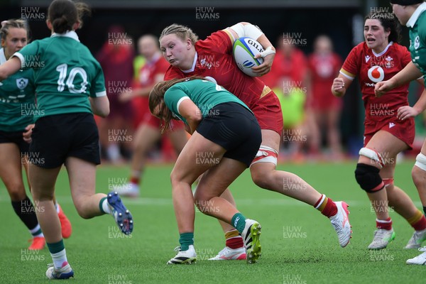 100526 - Wales U21 Women v Ireland U21 Women - Six Nations Women's U21 Series - Alaw Pyrs of Wales Women is challenged by Leah Irwin Ireland Women