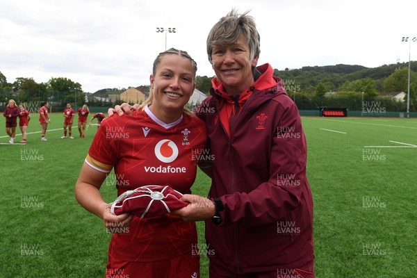 100526 - Wales U21 Women v Ireland U21 Women - Six Nations Women's U21 Series - Amy Williams of Wales Women is presented a cap by Liza Burgess, Wales Women's Head Coach