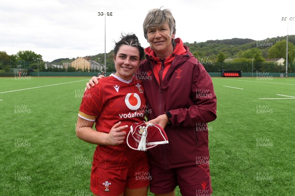 100526 - Wales U21 Women v Ireland U21 Women - Six Nations Women's U21 Series - Lucy Isaac of Wales Women is presented a cap by Liza Burgess, Wales Women's Head Coach